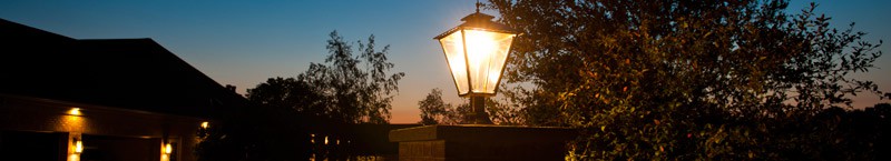 glowing gas lamps at night banner