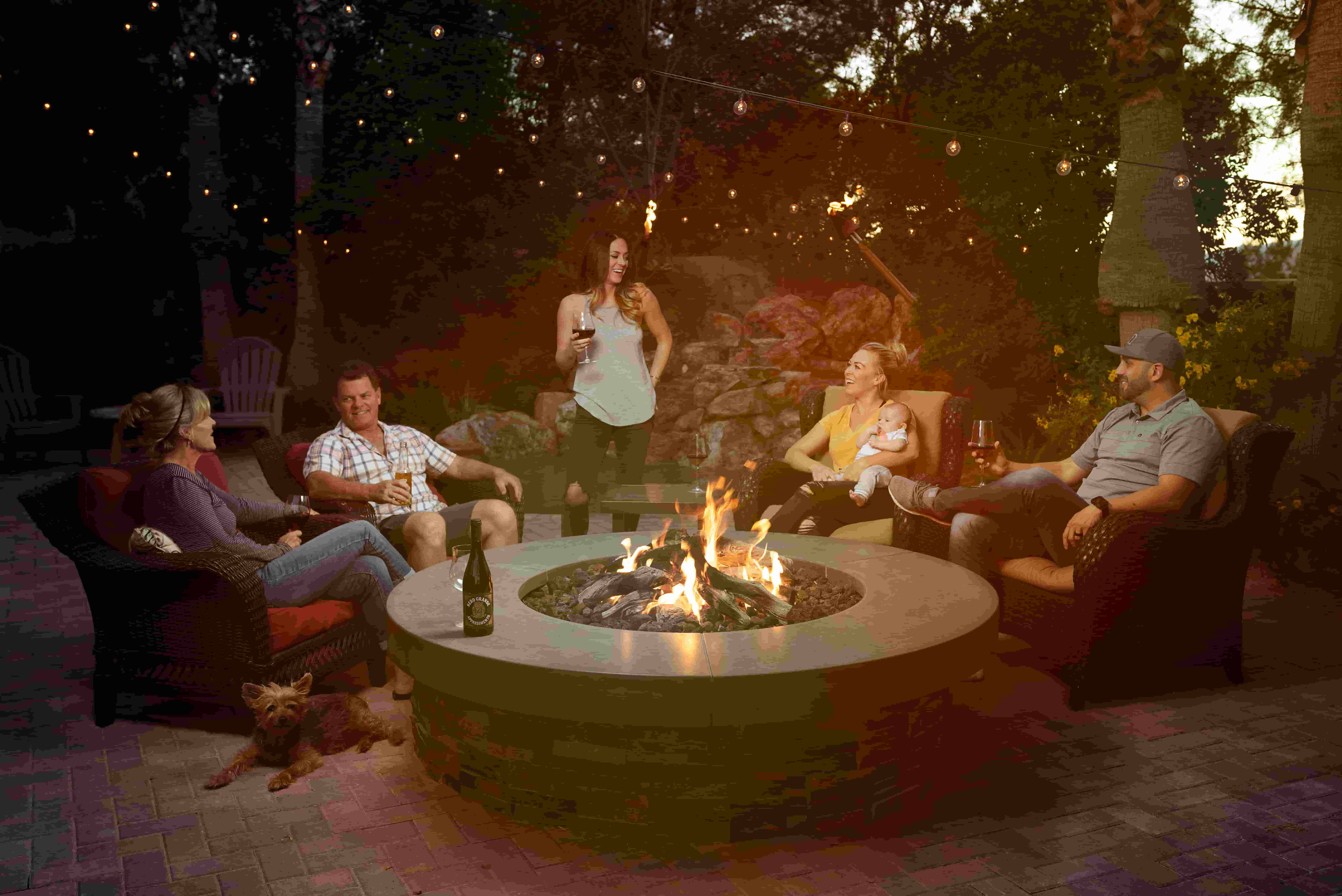 Friends around a fire pit by American Gas Lamp